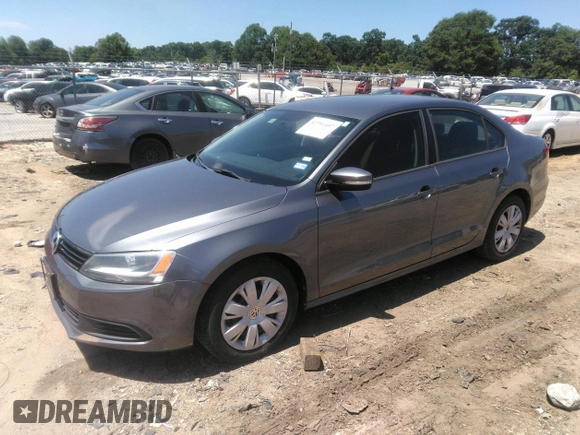 2014 Volkswagen Jetta SE z VIN 3VWD17AJ1EM412833, wystawiony jako IAAI lot #42351497 z przebiegiem 106 705 mil mil oraz . Historia ofert i sprzedaży dostępna na DreamBid. Obrazek 2.