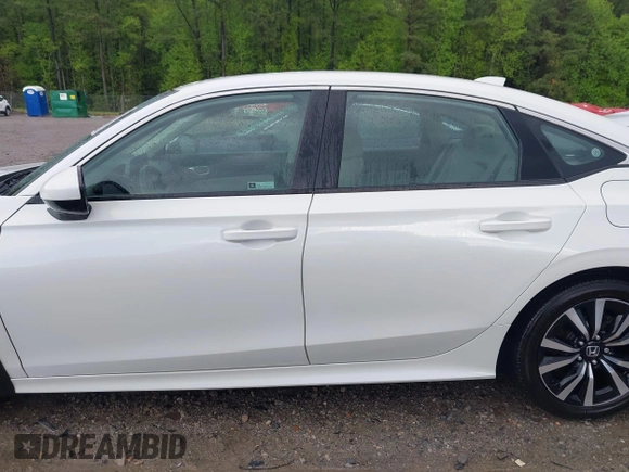 2023 Honda Civic EX z VIN 2HGFE1F79PH324822, wystawiony jako IAAI lot #42017274 z przebiegiem 36 862 mil mil oraz . Historia ofert i sprzedaży dostępna na DreamBid. Obrazek 14.