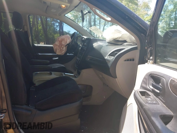 2014 Dodge Grand Caravan SXT with VIN 2C4RDGCG2ER313531, listed as a IAAI auction lot 42221726 with 177,065 mi miles and . Bid and sale history available at DreamBid. Image 5.