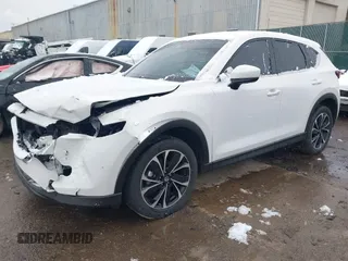 2023 Mazda CX-5 2.5 S Premium Package with VIN JM3KFBDM9P0124382, listed as a IAAI auction lot 40908008 with 25,148 mi miles. Bid and sale history available at carsss.com. Image 2.