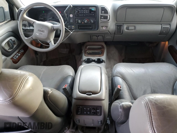 2000 GMC Denali z VIN 1GKEK63R9YR225073, wystawiony jako Copart lot #86819964 z przebiegiem 207 827 mil mil oraz Szkody całkowita. Historia ofert i sprzedaży dostępna na DreamBid. Obrazek 8.