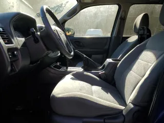 2006 Ford Escape XLT with VIN 1FMYU931X6KA18627, listed as a Copart auction lot 76713264 with 0 mi miles and Salvage Title. Bid and sale history available at carsss.com. Image 7.