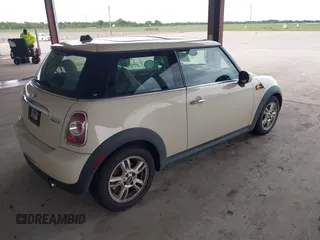 2011 MINI Hardtop with VIN WMWSU3C52BT091664, listed as a IAAI auction lot 42427367 with 110,488 mi miles and . Bid and sale history available at DreamBid. Image 4.