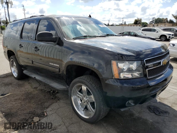 2013 Chevrolet Suburban LT with VIN 1GNSKJE76DR318499, listed as a Copart auction lot 71840624 with 191,050 mi miles and Salvage Title. Bid and sale history available at carsss.com. Image 4.