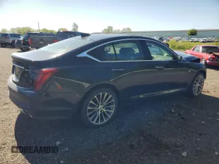 2020 Cadillac CT5 Premium Luxury z VIN 1G6DT5RK9L0156121, wystawiony jako Copart lot #57430325 z przebiegiem 40 815 mil mil oraz Czysty tytuł • Clean title. Historia ofert i sprzedaży dostępna na DreamBid. Obrazek 3.