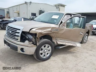 2013 Ford F-150 XL with VIN 1FTFW1CF9DKE87238, listed as a IAAI auction lot 41932263 with 183,871 mi miles. Bid and sale history available at carsss.com. Image 2.
