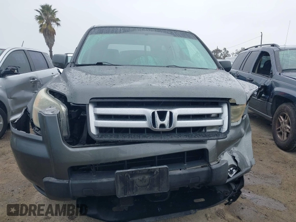 2007 Honda Pilot EX with VIN 2HKYF18497H500458, listed as a IAAI auction lot 41784273 with 114,454 mi miles. Bid and sale history available at carsss.com. Image 12.
