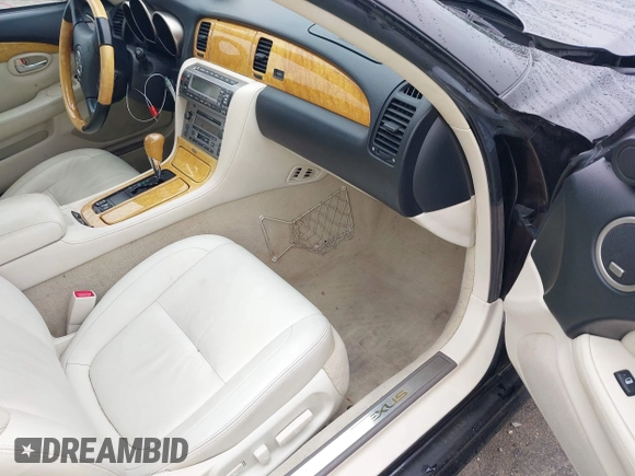 2004 Lexus SC 430 with VIN JTHFN48Y140059592, listed as a IAAI auction lot 42189576 with 101,014 mi miles and . Bid and sale history available at DreamBid. Image 5.