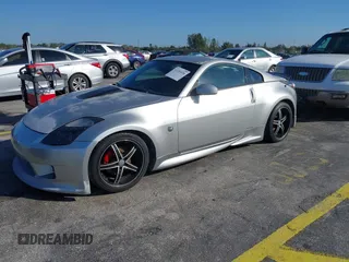 2003 Nissan 350Z Touring z VIN JN1AZ34E23T019866, wystawiony jako IAAI lot #41293510 z przebiegiem 118 416 mil mil oraz . Historia ofert i sprzedaży dostępna na DreamBid. Obrazek 2.