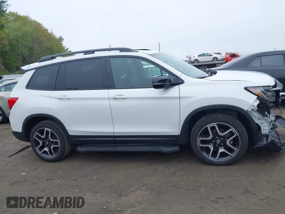 2023 Honda Passport Elite with VIN 5FNYF8H00PB022743, listed as a IAAI auction lot 42192958 with 25,165 mi miles and . Bid and sale history available at DreamBid. Image 13.