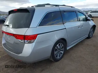 2014 Honda Odyssey Touring with VIN 5FNRL5H93EB066162, listed as a IAAI auction lot 41734783 with 173,063 mi miles and . Bid and sale history available at DreamBid. Image 4.