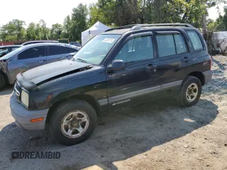 2002 Chevrolet Tracker z VIN 2CNBJ13CX26927627, wystawiony jako Copart lot #63238774 z przebiegiem 161 101 mil mil oraz Nie do naprawy • Non repairable. Historia ofert i sprzedaży dostępna na DreamBid. Obrazek 1.