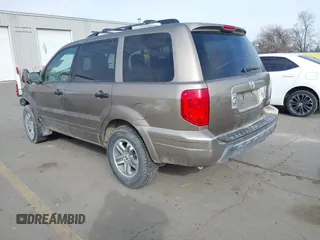 2005 Honda Pilot EX-L z VIN 2HKYF18665H523484, wystawiony jako IAAI lot #41697429 z przebiegiem 294 241 mil mil oraz . Historia ofert i sprzedaży dostępna na DreamBid. Obrazek 3.