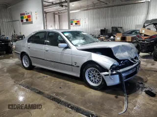2000 BMW 5 Series 528iA with VIN WBADM6343YGU14817, listed as a Copart auction lot 41567125 with 0 mi miles and Salvage Title. Bid and sale history available at carsss.com. Image 4.