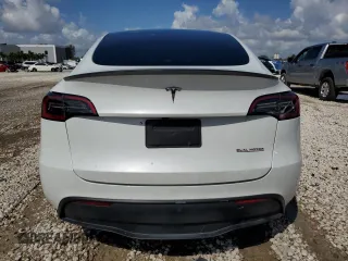 2023 Tesla Model Y Performance with VIN 7SAYGDEF0PF832570, listed as a Copart auction lot 51141415 with Not Provided miles and Non Repairable. Bid and sale history available at DreamBid. Image 6.