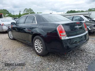 2013 Chrysler 300 with VIN 2C3CCAAG8DH515050, listed as a IAAI auction lot 41905134 with 137,837 mi miles. Bid and sale history available at carsss.com. Image 3.