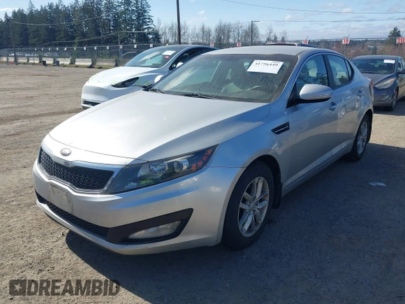 2013 Kia Optima LX z VIN KNAGM4A74D5371383, wystawiony jako IAAI lot #41756449 z przebiegiem 133 002 mil mil oraz . Historia ofert i sprzedaży dostępna na DreamBid. Obrazek 2.