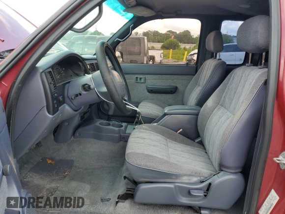 1999 Toyota Tacoma PreRunner with VIN 4TASN92N2XZ463119, listed as a Copart auction lot 59575775 with 172,223 mi miles and Salvage title. Bid and sale history available at DreamBid. Image 7.