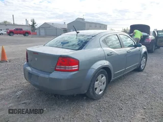 2010 Dodge Avenger SXT with VIN 1B3CC4FB3AN191486, listed as a IAAI auction lot 42106448 with 209,417 mi miles. Bid and sale history available at carsss.com. Image 4.