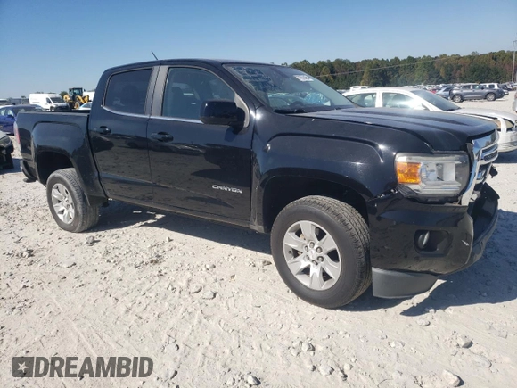 2015 GMC Canyon 2WD SLE with VIN 1GTG5BEA6F1221120, listed as a Copart auction lot 77391484 with 180,334 mi miles and Salvage Title. Bid and sale history available at carsss.com. Image 4.