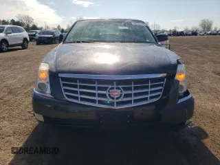 2008 Cadillac DTS 1SC z VIN 1G6KD57Y68U111388, wystawiony jako Copart lot #54204465 z przebiegiem 122 077 mil mil oraz Szkoda całkowita • Salvage title. Historia ofert i sprzedaży dostępna na DreamBid. Obrazek 5.