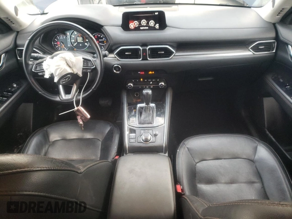 2020 Mazda CX-5 Grand Touring with VIN JM3KFADM4L1783968, listed as a Copart auction lot 85994244 with 89,074 mi miles and Salvage Title. Bid and sale history available at DreamBid. Image 8.
