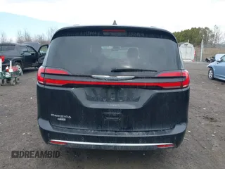 2022 Chrysler Pacifica Touring L with VIN 2C4RC1BG2NR117879, listed as a IAAI auction lot 41845778 with 96,523 mi miles and . Bid and sale history available at DreamBid. Image 16.