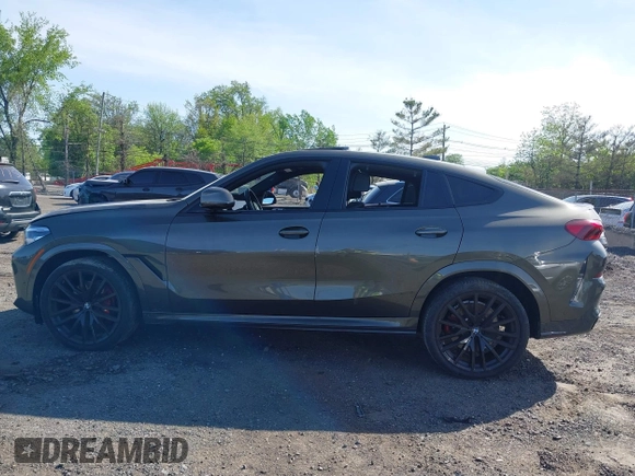 2021 BMW X6 sDrive40i z VIN 5UXCY4C06M9F26841, wystawiony jako IAAI lot #42122749 z przebiegiem 10 072 mil mil oraz . Historia ofert i sprzedaży dostępna na DreamBid. Obrazek 13.