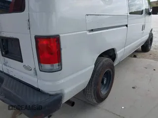 2001 Ford Econoline Cargo with VIN 1FTRE14261HA22632, listed as a IAAI auction lot 41202164 with 153,412 mi miles and . Bid and sale history available at DreamBid. Image 6.