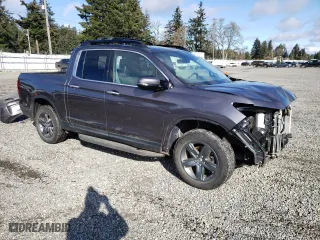2021 Honda Ridgeline RTL-E with VIN 5FPYK3F7XMB016871, listed as a Copart auction lot 49159985 with 26,775 mi miles and Salvage Title. Bid and sale history available at carsss.com. Image 4.