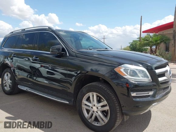 2014 Mercedes-Benz GL 450 z VIN 4JGDF7CE1EA342408, wystawiony jako IAAI lot #41968441 z przebiegiem 120 459 mil mil oraz . Historia ofert i sprzedaży dostępna na DreamBid. Obrazek 6.