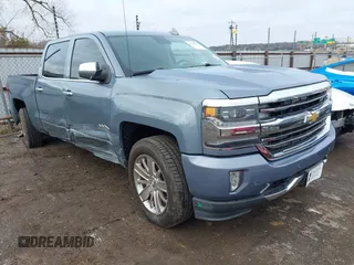 2016 Chevrolet Silverado 1500 High Country with VIN 3GCUKTEC5GG131060, listed as a IAAI auction lot 41108622 with 138,372 mi miles and . Bid and sale history available at DreamBid. Image 1.