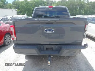 2021 Ford F-150 XL with VIN 1FTFW1E8XMFC04210, listed as a IAAI auction lot 42493373 with 99,181 mi miles and . Bid and sale history available at DreamBid. Image 16.
