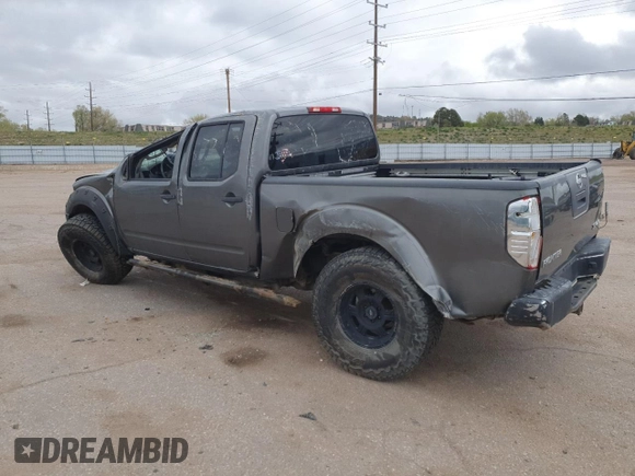 2008 Nissan Frontier LE with VIN 1N6AD09W58C437225, listed as a Copart auction lot 52687295 with 247,258 mi miles and Salvage title. Bid and sale history available at DreamBid. Image 2.