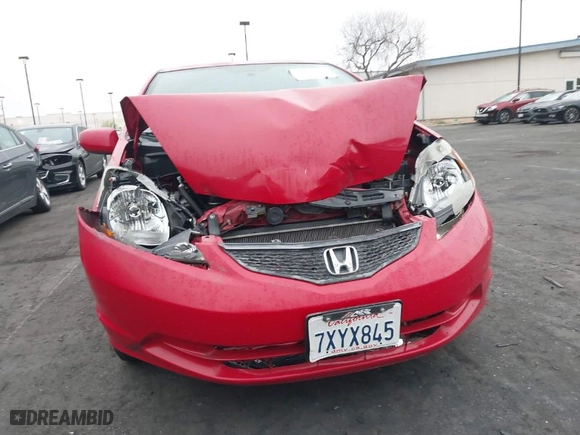 2013 Honda Fit with VIN JHMGE8H3XDC034737, listed as a IAAI auction lot 41865531 with 91,747 mi miles. Bid and sale history available at carsss.com. Image 6.