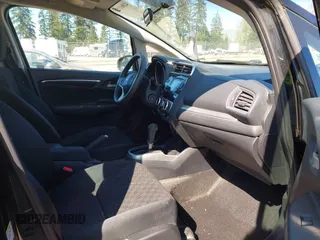 2015 Honda Fit LX with VIN 3HGGK5H58FM765907, listed as a IAAI auction lot 42061158 with 120,178 mi miles. Bid and sale history available at carsss.com. Image 5.