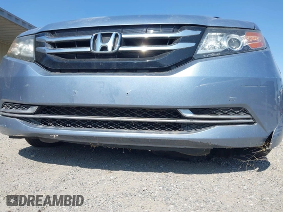 2014 Honda Odyssey EX-L with VIN 5FNRL5H65EB103900, listed as a IAAI auction lot 42592359 with 53,276 mi miles and . Bid and sale history available at DreamBid. Image 6.