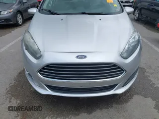 2017 Ford Fiesta S z VIN 3FADP4AJ1HM104006, wystawiony jako IAAI lot #41943413 z przebiegiem 111 873 mil mil oraz . Historia ofert i sprzedaży dostępna na DreamBid. Obrazek 12.