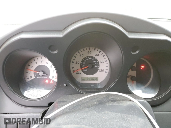 2004 Nissan Frontier XE z VIN 1N6ED27T34C449972, wystawiony jako Copart lot #87205714 z przebiegiem 254 636 mil mil oraz Szkoda całkowita • Salvage title. Historia ofert i sprzedaży dostępna na DreamBid. Obrazek 9.