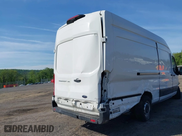 2021 Ford Transit Cargo z VIN 1FTBW3X84MKA60720, wystawiony jako IAAI lot #42202665 z przebiegiem 67 295 mil mil oraz . Historia ofert i sprzedaży dostępna na DreamBid. Obrazek 19.