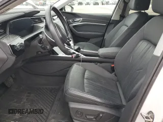 2021 Audi e-tron Premium Plus with VIN WA1LAAGE4MB003487, listed as a Copart auction lot 82790024 with 28,165 mi miles and Salvage title. Bid and sale history available at DreamBid. Image 7.