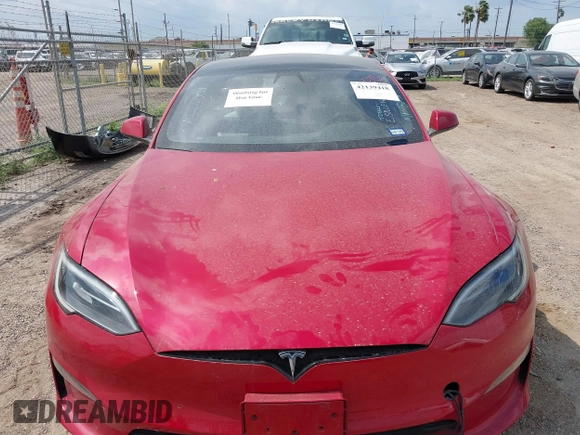 2022 Tesla Model S with VIN 5YJSA1E58NF486727, listed as a IAAI auction lot 42139418 with Not provided miles and . Bid and sale history available at DreamBid. Image 10.