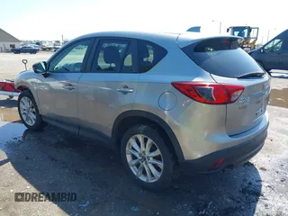 2013 Mazda CX-5 Grand Touring with VIN JM3KE4DE9D0137085, listed as a IAAI auction lot 41978534 with 103,720 mi miles and . Bid and sale history available at carsss.com. Image 3.