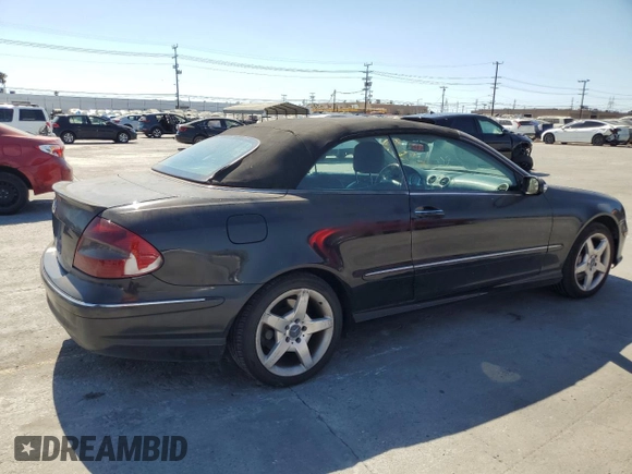 2006 Mercedes-Benz CLK-Class 5.0L with VIN WDBTK75G96T063299, listed as a Copart auction lot 69882884 with 148,934 mi miles and Salvage Title. Bid and sale history available at carsss.com. Image 3.