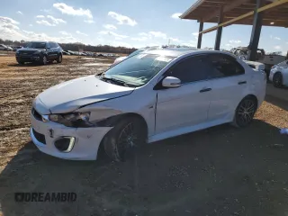 2016 Mitsubishi Lancer GT with VIN JA32U8FW4GU012628, listed as a Copart auction lot 84090824 with 185,506 mi miles and Salvage Title. Bid and sale history available at carsss.com. Image 1.