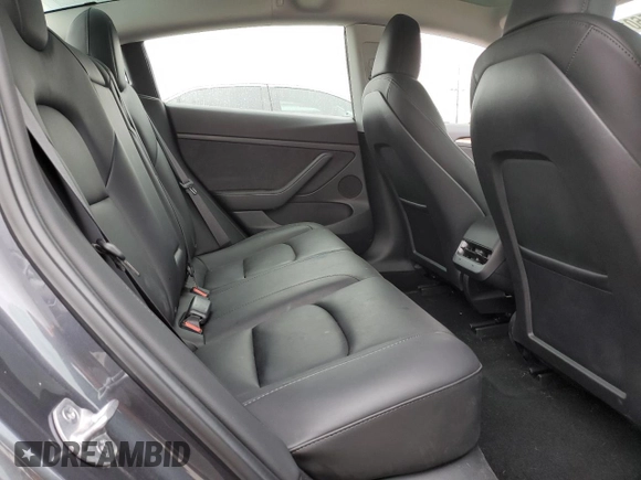 2023 Tesla Model 3 with VIN 5YJ3E1EA3PF697049, listed as a Copart auction lot 55601295 with 12,373 mi miles and Salvage Title. Bid and sale history available at DreamBid. Image 10.