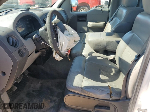 2006 Ford F-150 XL with VIN 1FTRF12W06NA22654, listed as a Copart auction lot 57064735 with 228,697 mi miles and Salvage title. Bid and sale history available at DreamBid. Image 7.