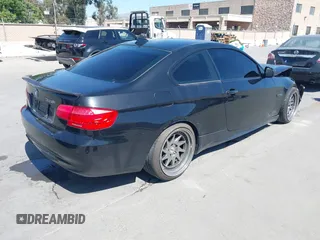 2011 BMW 3 Series 328i with VIN WBAKE3C51BE557814, listed as a IAAI auction lot 42196874 with 114,255 mi miles and . Bid and sale history available at carsss.com. Image 4.