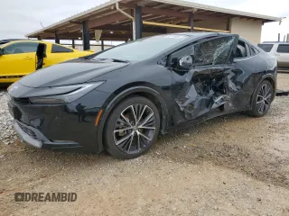 2024 Toyota Prius LE z VIN JTDADABU0R3007668, wystawiony jako Copart lot #52110565 z przebiegiem 29 984 mil mil oraz Szkoda całkowita • Salvage title. Historia ofert i sprzedaży dostępna na DreamBid. Obrazek 1.