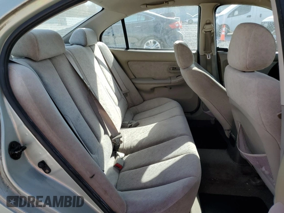 2004 Hyundai Elantra GLS z VIN KMHDN46D24U906147, wystawiony jako Copart lot #78170704 z przebiegiem 179 207 mil mil oraz Czysty tytuł • Clean title. Historia ofert i sprzedaży dostępna na DreamBid. Obrazek 10.